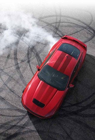 Overhead view of a 2024 Ford Mustang® model with tire tracks on pavement | Edd Rogers Valley Ford in Sparta TN