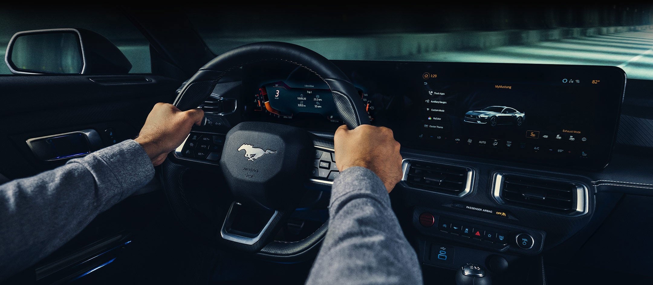 A 2024 Ford Mustang® model interior with a person driving | Edd Rogers Valley Ford in Sparta TN